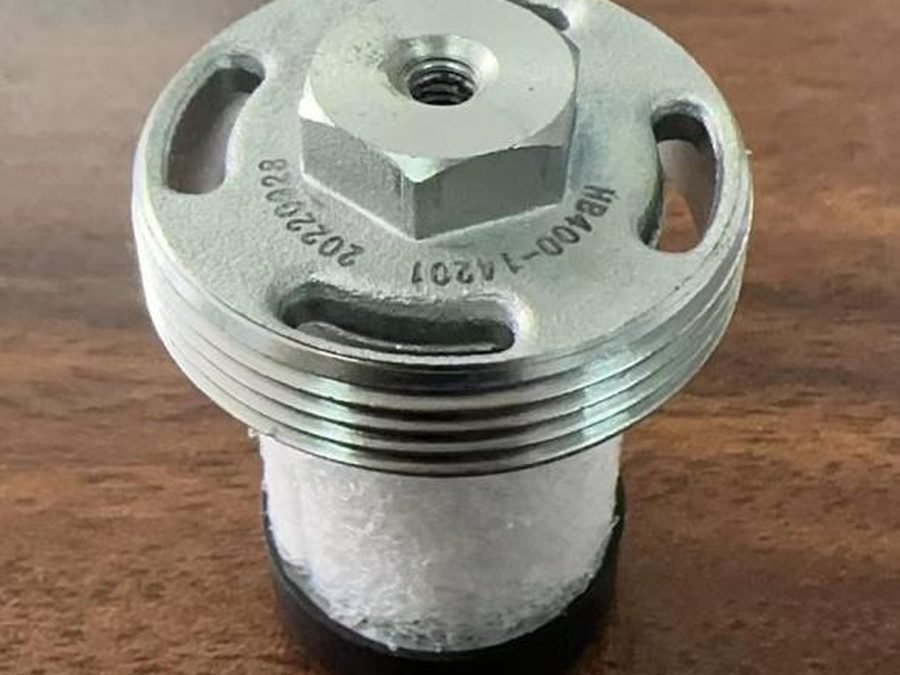 Hydraulic filter element with threaded cap
